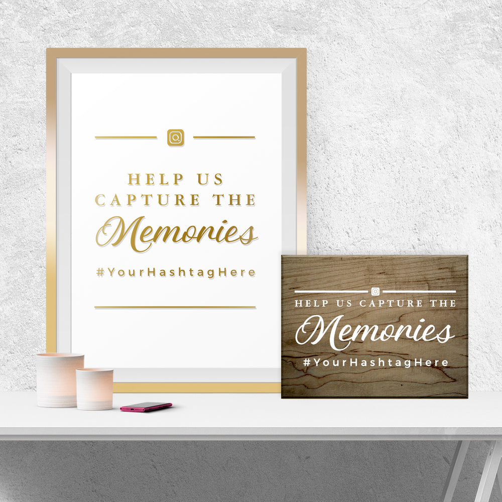 a framed sign with the text "Help us capture the Memories" and a wooden sign with the same text.