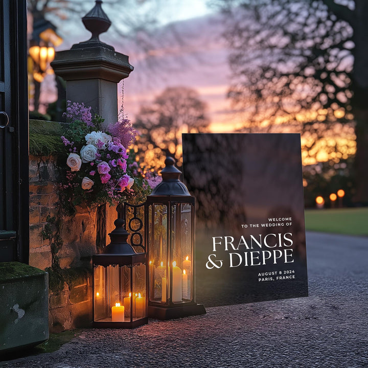 a couple of lanterns sitting next to a sign