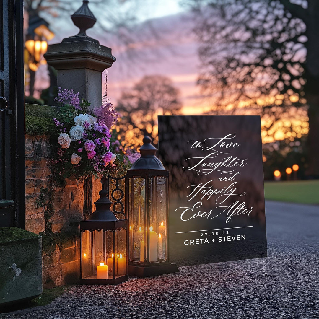 a couple of lanterns sitting next to a sign