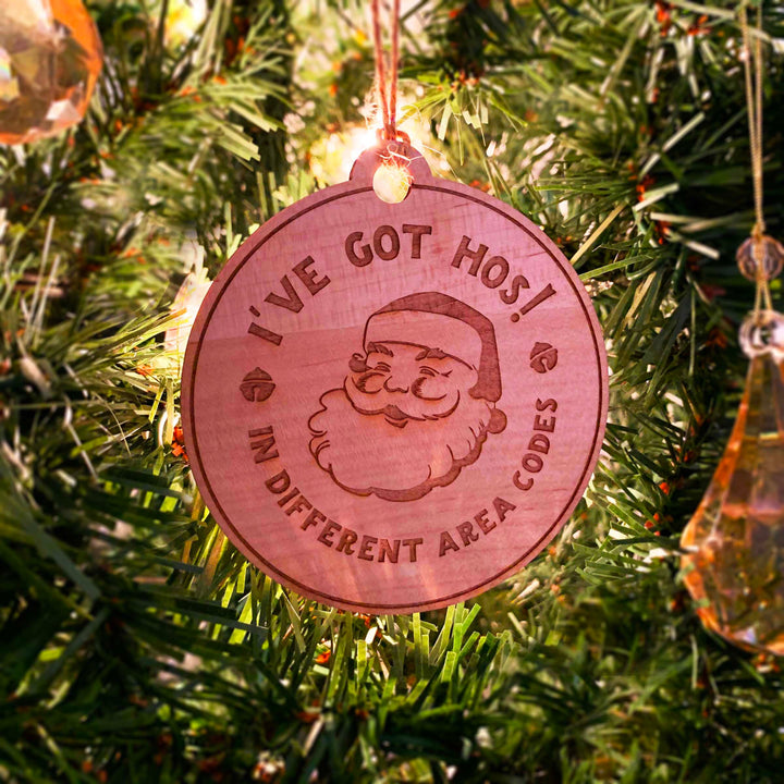 Engraved Christmas Tree Ornament - Cheeky Santa's 'Hos in Area Codes'